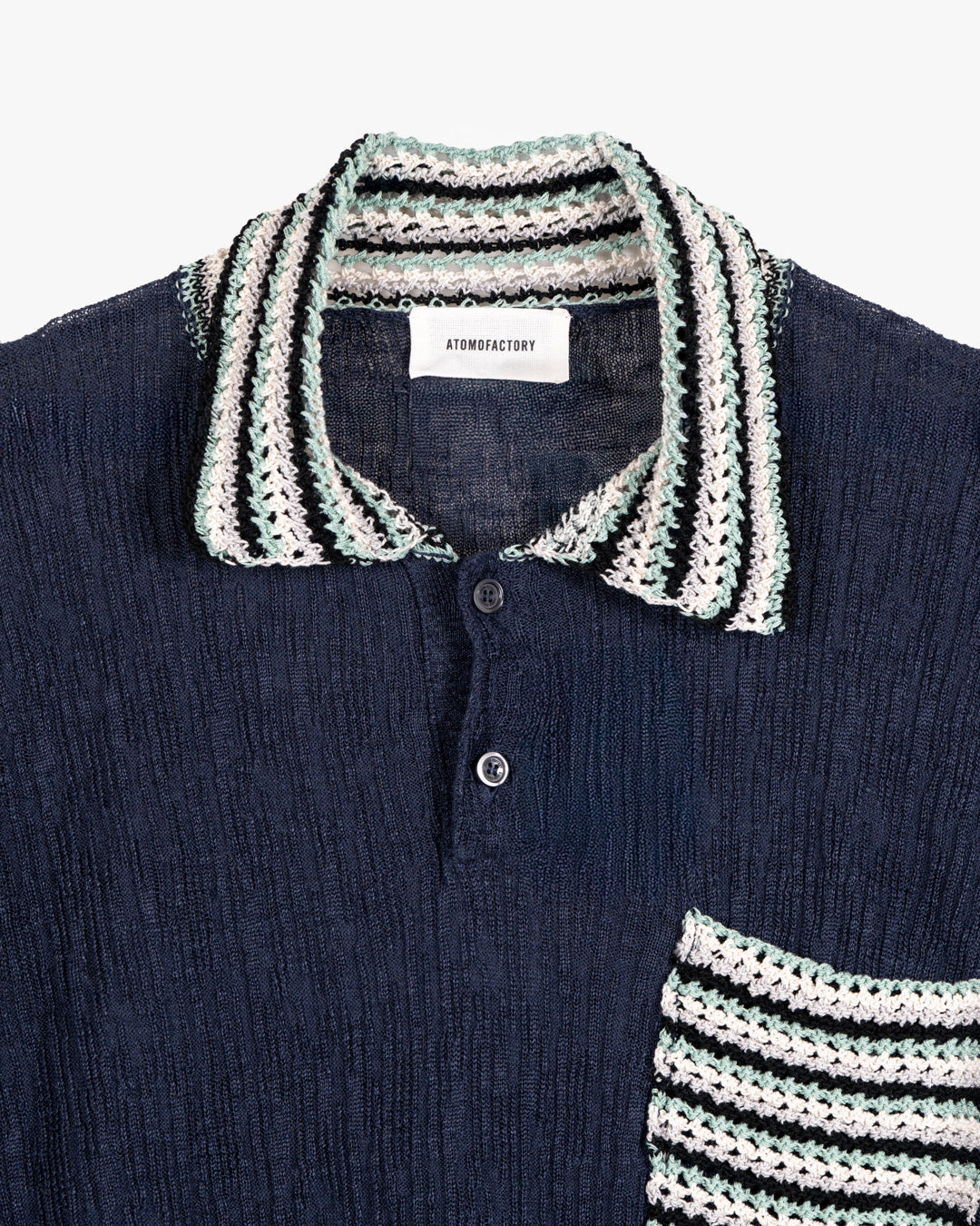 Polo in lino con finiture intarsia in cotone