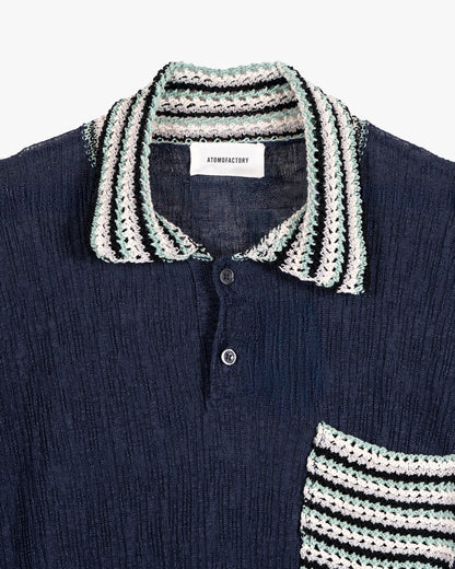 Polo in lino con finiture intarsia in cotone