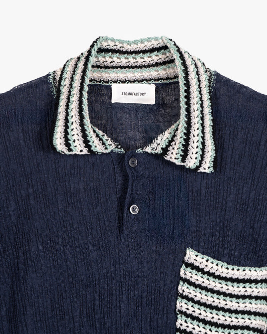 Polo in lino con finiture intarsia in cotone